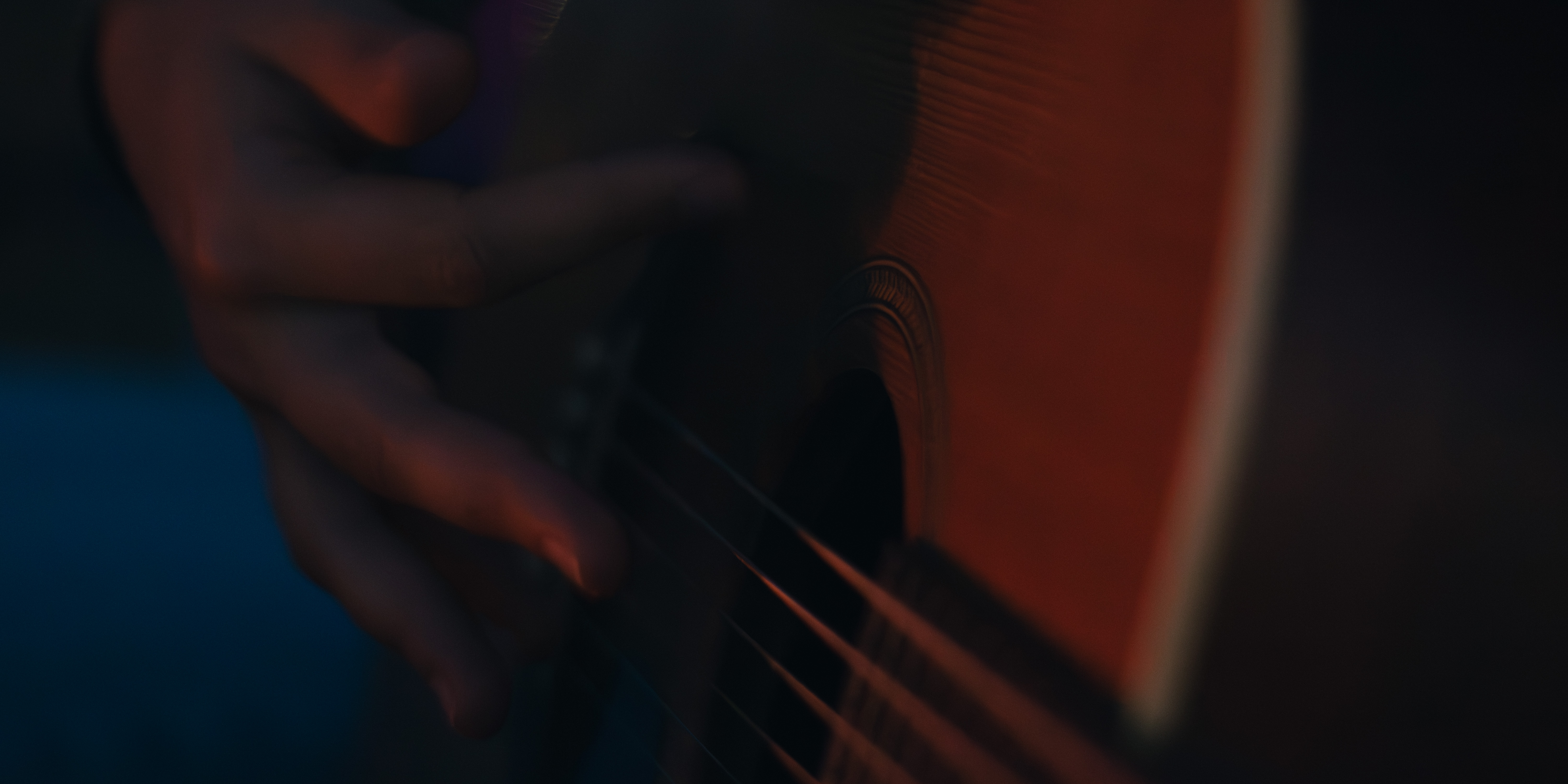 Mountain range glowing under a low sun.